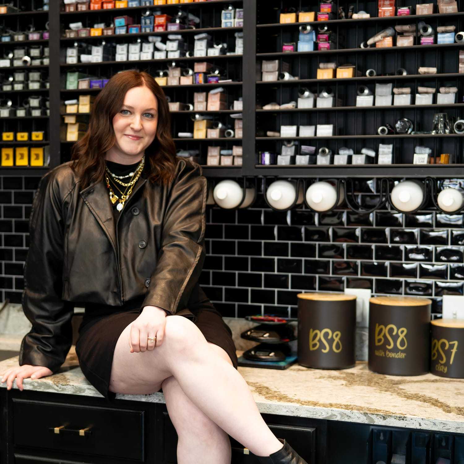 Portrait of Sophie, a professional stylist at Elevate Hair Studio by Tricia Cosgrove, showcasing their expertise and style.